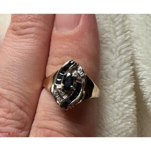 Vintage but new 10k gold ring with oval and square cut sapphires and diamonds.